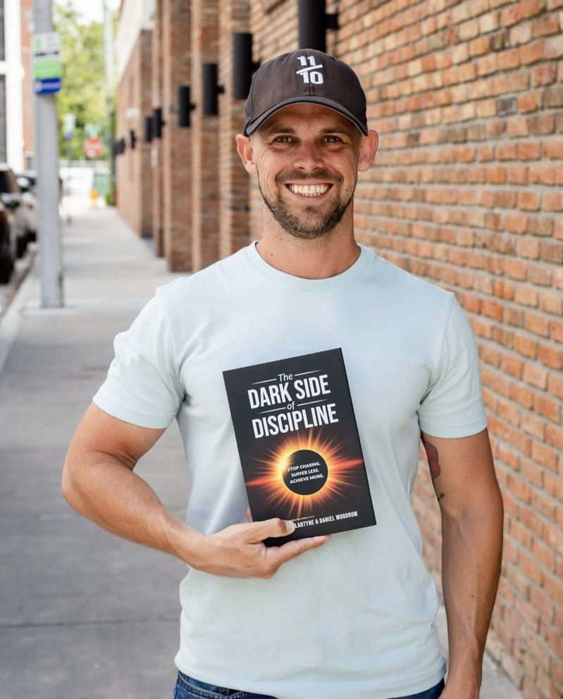 Daniel Woodrum holding The Dark Side of Discipline