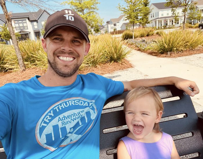 Daniel with his daughter laughing together